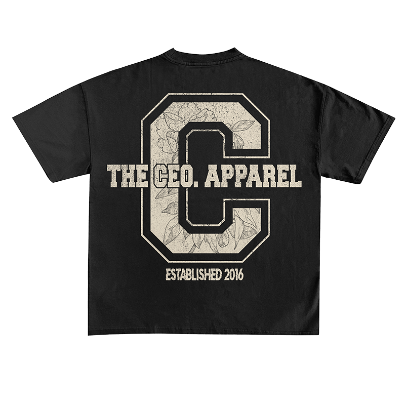Back view of a black The CEO. Apparel t-shirt with a large distressed collegiate “C” graphic, floral texture detailing, and “Established 2016” text.