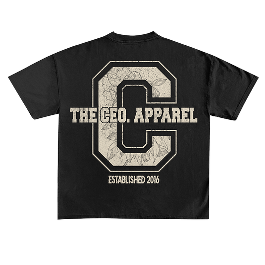 Back view of a black The CEO. Apparel t-shirt with a large distressed collegiate “C” graphic, floral texture detailing, and “Established 2016” text.