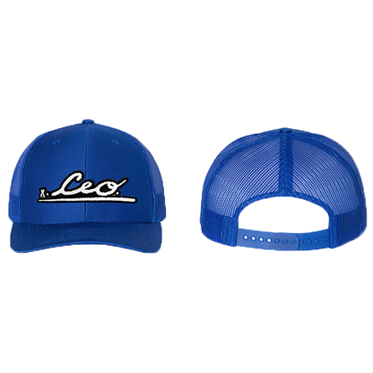 Front and back view of The CEO. Apparel blue snapback trucker hat featuring the embroidered CEO. logo in black and white.