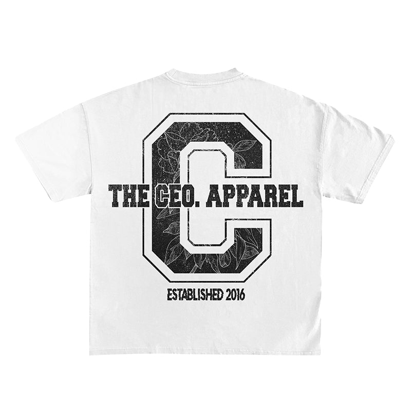 Back view of a white The CEO. Apparel t-shirt with a large distressed collegiate “C” graphic, floral texture detailing, and “Established 2016” text.